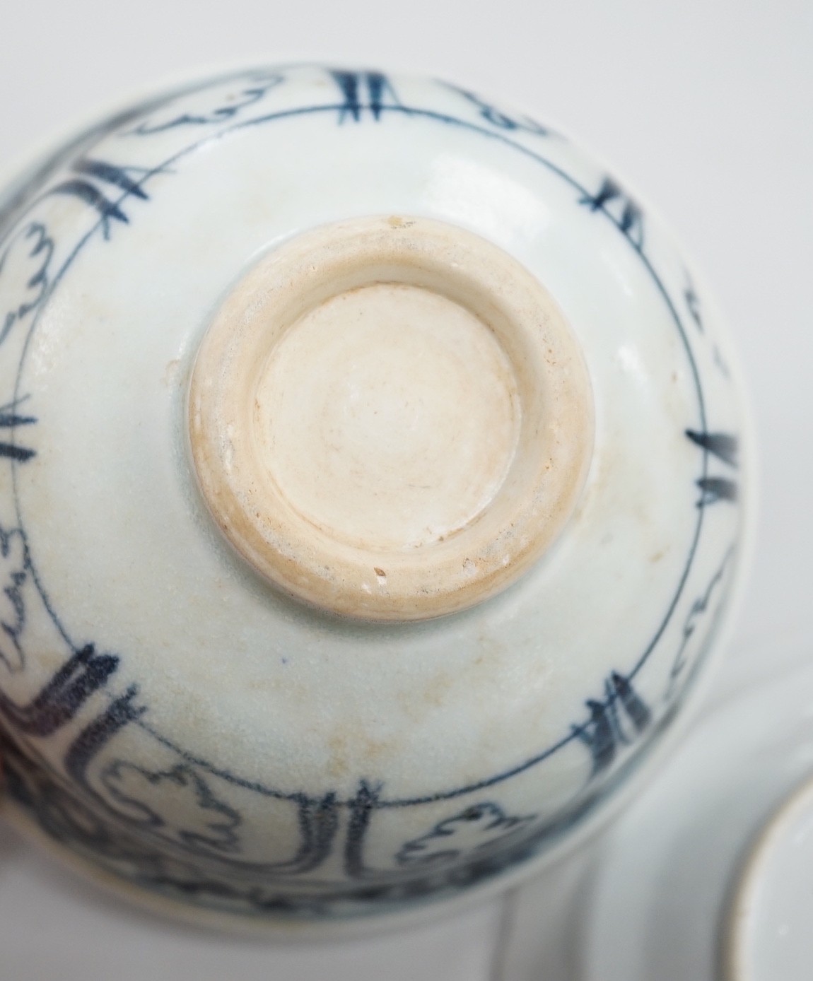 A small Chinese Ming blue and white bowl, and other, together with two small saucers (4)